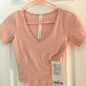 Lulu Lemon Nulu TM cropped slim Yoga top. Slim fit. Cropped length